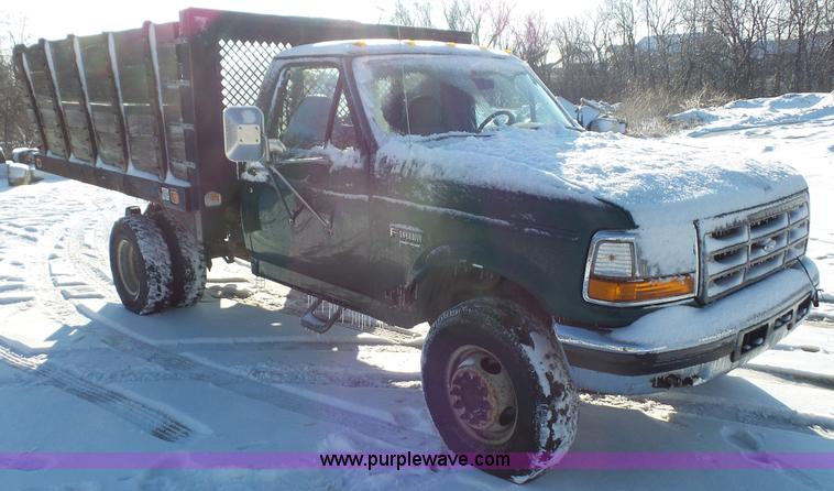 image for item J4526 1996 Ford F450 Super Duty dump flatbed truck