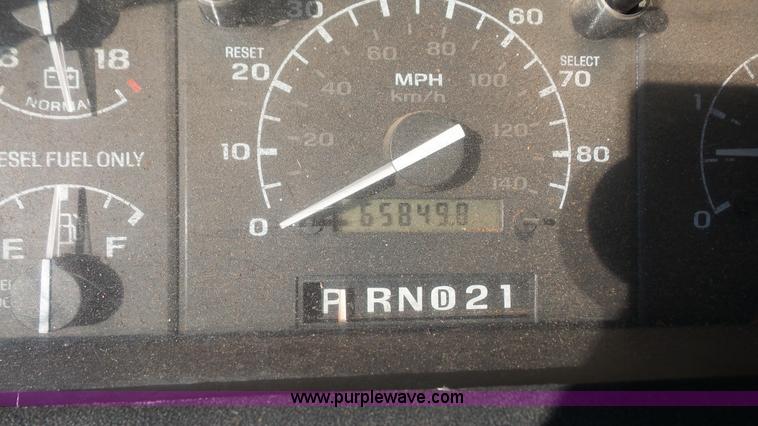 image for item J4526 1996 Ford F450 Super Duty dump flatbed truck