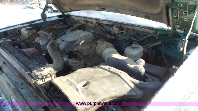 image for item J4526 1996 Ford F450 Super Duty dump flatbed truck