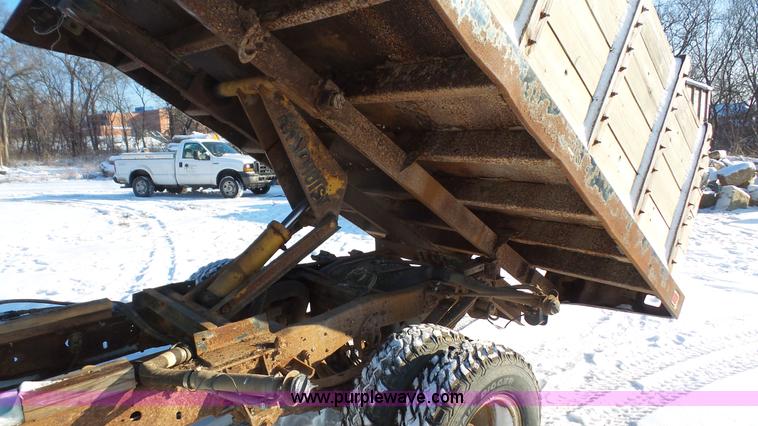 image for item J4526 1996 Ford F450 Super Duty dump flatbed truck