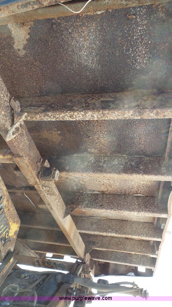 image for item J4526 1996 Ford F450 Super Duty dump flatbed truck