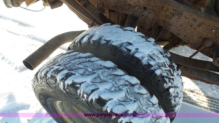 image for item J4526 1996 Ford F450 Super Duty dump flatbed truck