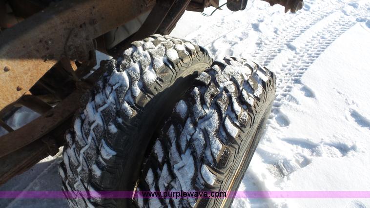 image for item J4526 1996 Ford F450 Super Duty dump flatbed truck