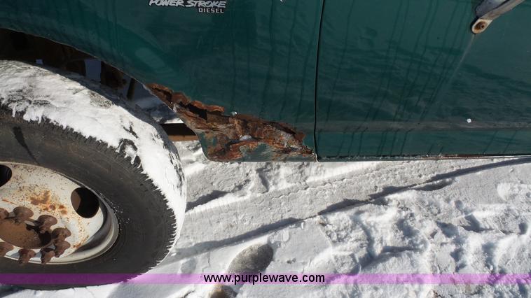 image for item J4526 1996 Ford F450 Super Duty dump flatbed truck