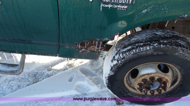 image for item J4526 1996 Ford F450 Super Duty dump flatbed truck