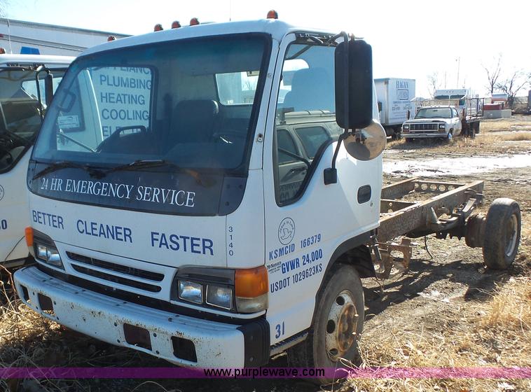 image for item J4555 1999 Isuzu NPR truck cab and chassis