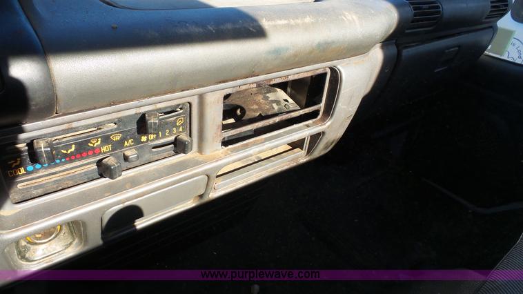 image for item J4555 1999 Isuzu NPR truck cab and chassis