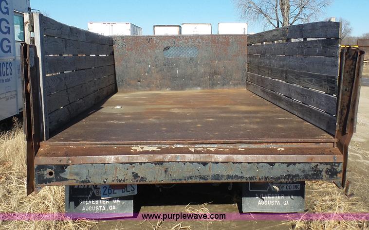 image for item J4556 1988 Ford F350 flatbed pickup truck