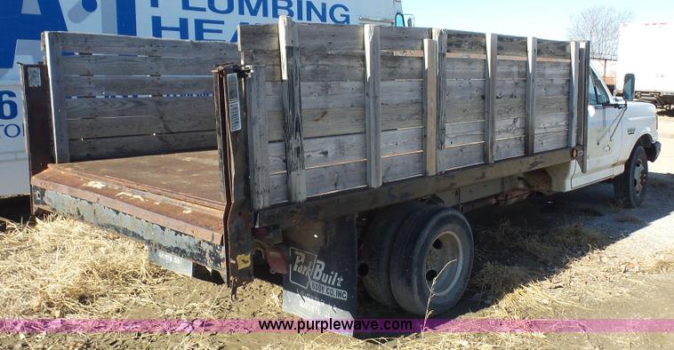 image for item J4556 1988 Ford F350 flatbed pickup truck