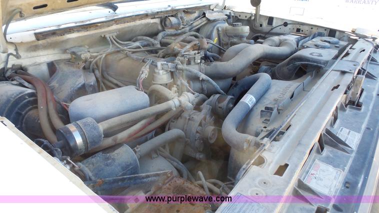 image for item J4556 1988 Ford F350 flatbed pickup truck