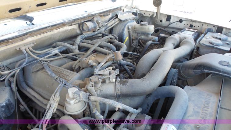 image for item J4556 1988 Ford F350 flatbed pickup truck