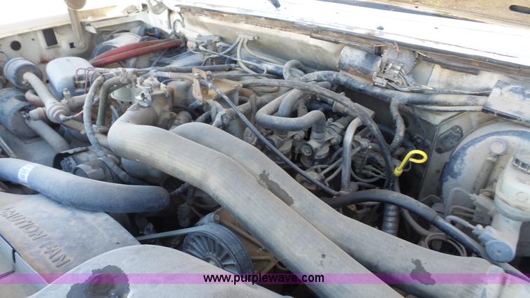 image for item J4556 1988 Ford F350 flatbed pickup truck