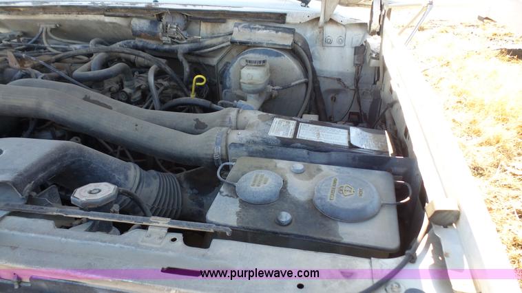 image for item J4556 1988 Ford F350 flatbed pickup truck