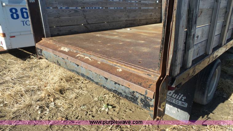 image for item J4556 1988 Ford F350 flatbed pickup truck