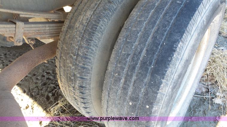 image for item J4556 1988 Ford F350 flatbed pickup truck