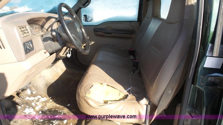 image for item J4640 1999 Ford F350 Super Duty XL Crew Cab flatbed pickup truck