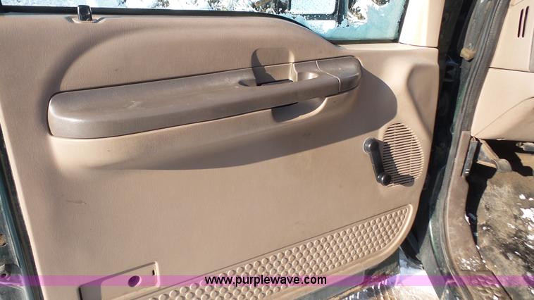 image for item J4640 1999 Ford F350 Super Duty XL Crew Cab flatbed pickup truck