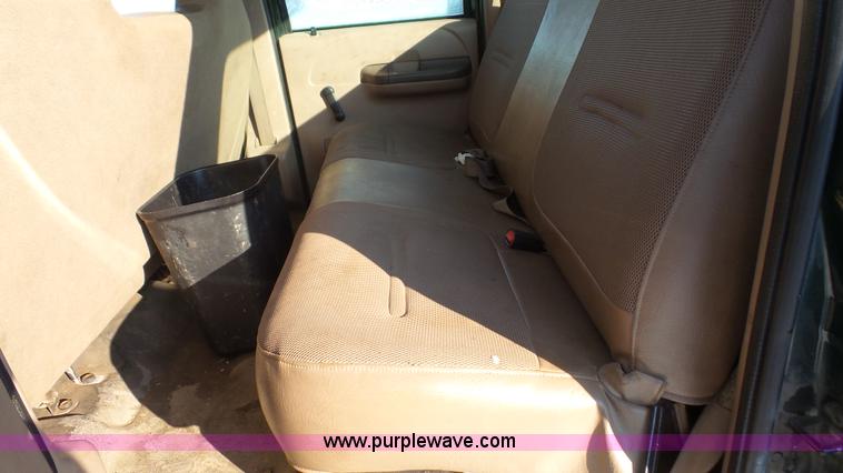 image for item J4640 1999 Ford F350 Super Duty XL Crew Cab flatbed pickup truck