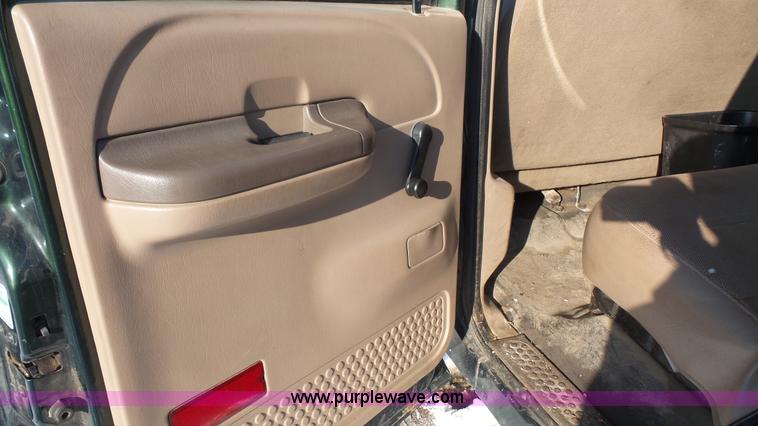 image for item J4640 1999 Ford F350 Super Duty XL Crew Cab flatbed pickup truck