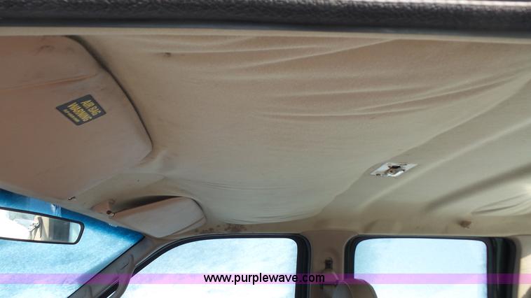 image for item J4640 1999 Ford F350 Super Duty XL Crew Cab flatbed pickup truck