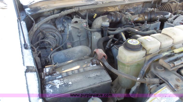 image for item J4640 1999 Ford F350 Super Duty XL Crew Cab flatbed pickup truck