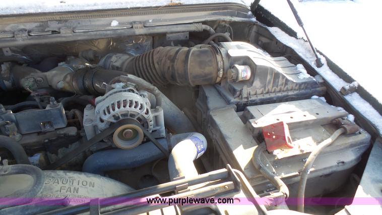 image for item J4640 1999 Ford F350 Super Duty XL Crew Cab flatbed pickup truck