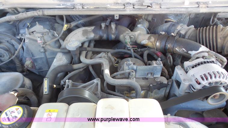 image for item J4640 1999 Ford F350 Super Duty XL Crew Cab flatbed pickup truck