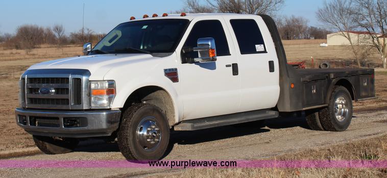 image for item J7642 2008 Ford F350 Super Duty XLT Crew Cab flatbed pickup truck