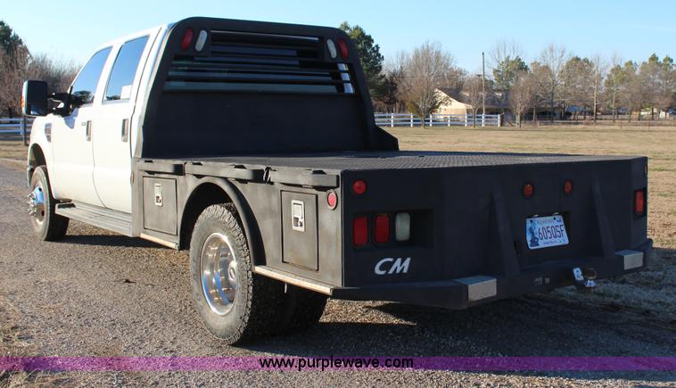 image for item J7642 2008 Ford F350 Super Duty XLT Crew Cab flatbed pickup truck