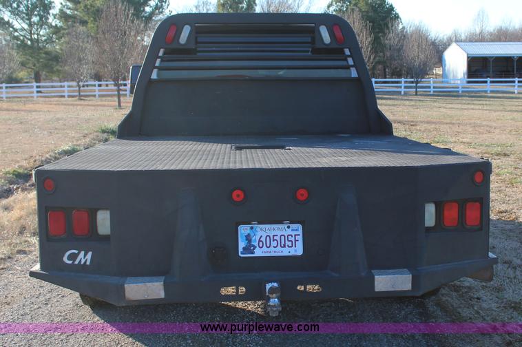 image for item J7642 2008 Ford F350 Super Duty XLT Crew Cab flatbed pickup truck