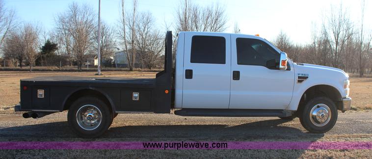 image for item J7642 2008 Ford F350 Super Duty XLT Crew Cab flatbed pickup truck