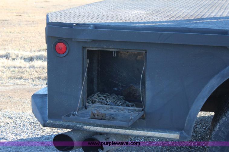 image for item J7642 2008 Ford F350 Super Duty XLT Crew Cab flatbed pickup truck