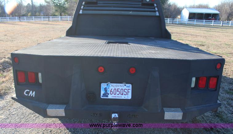 image for item J7642 2008 Ford F350 Super Duty XLT Crew Cab flatbed pickup truck