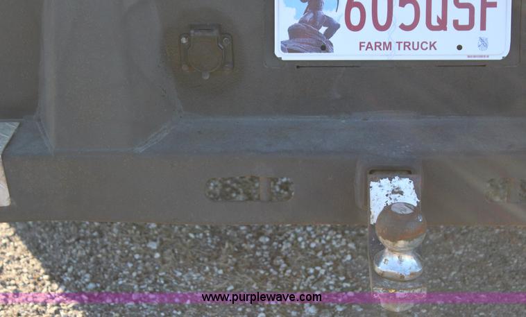 image for item J7642 2008 Ford F350 Super Duty XLT Crew Cab flatbed pickup truck