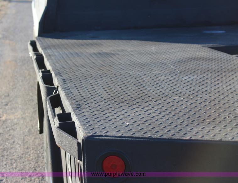 image for item J7642 2008 Ford F350 Super Duty XLT Crew Cab flatbed pickup truck