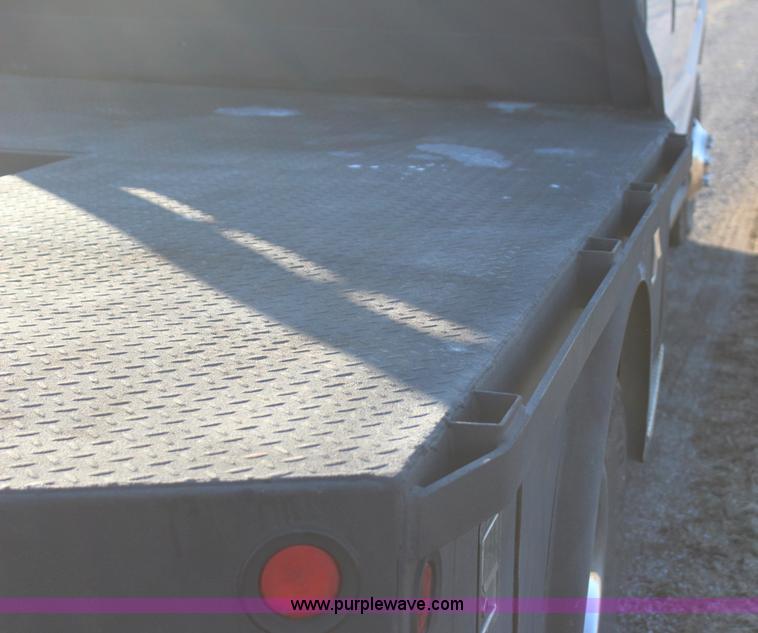 image for item J7642 2008 Ford F350 Super Duty XLT Crew Cab flatbed pickup truck