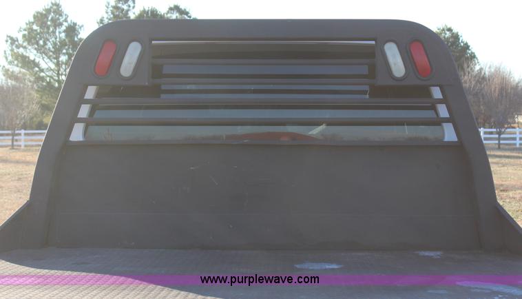 image for item J7642 2008 Ford F350 Super Duty XLT Crew Cab flatbed pickup truck