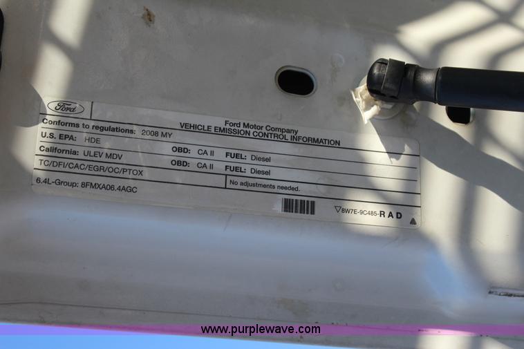 image for item J7642 2008 Ford F350 Super Duty XLT Crew Cab flatbed pickup truck