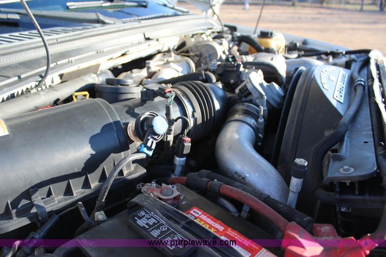 image for item J7642 2008 Ford F350 Super Duty XLT Crew Cab flatbed pickup truck