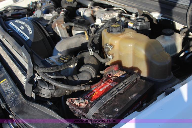 image for item J7642 2008 Ford F350 Super Duty XLT Crew Cab flatbed pickup truck