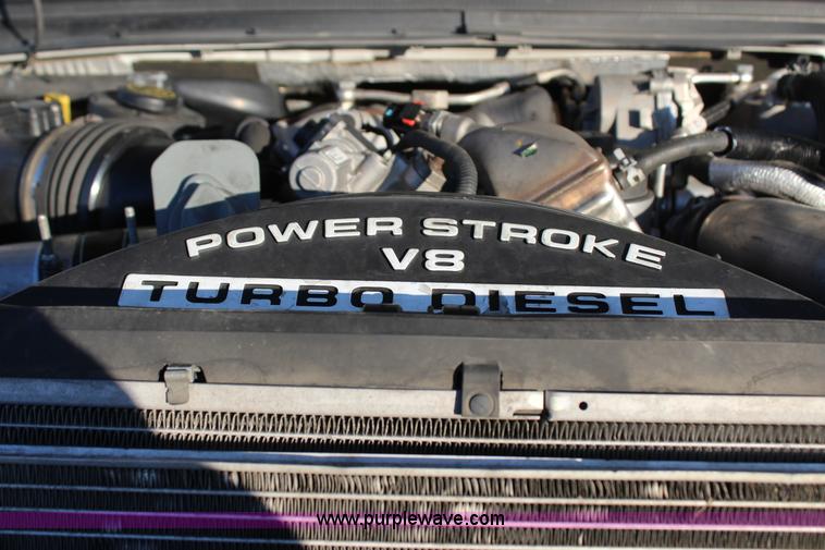 image for item J7642 2008 Ford F350 Super Duty XLT Crew Cab flatbed pickup truck