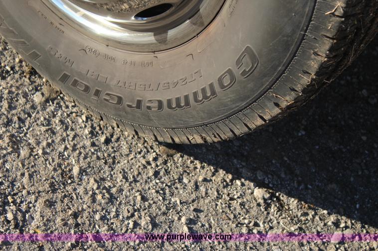 image for item J7642 2008 Ford F350 Super Duty XLT Crew Cab flatbed pickup truck