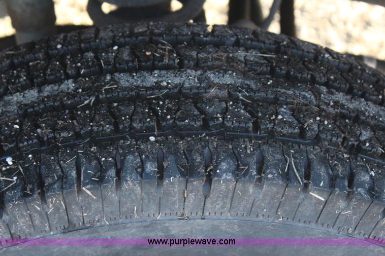 image for item J7642 2008 Ford F350 Super Duty XLT Crew Cab flatbed pickup truck