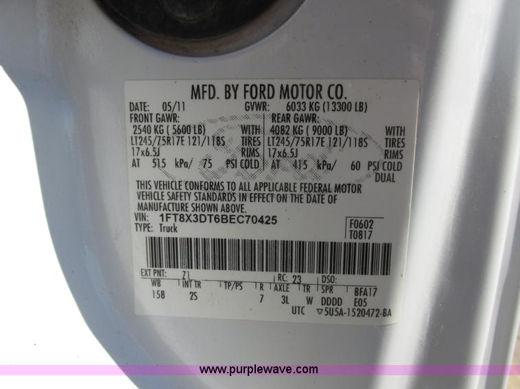 image for item J7688 2011 Ford F350 Super Duty SuperCab flatbed pickup truck