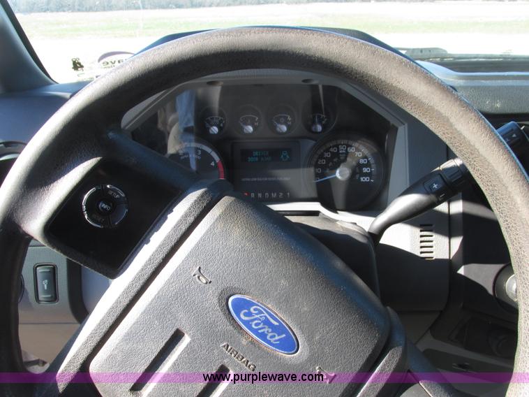 image for item J7688 2011 Ford F350 Super Duty SuperCab flatbed pickup truck