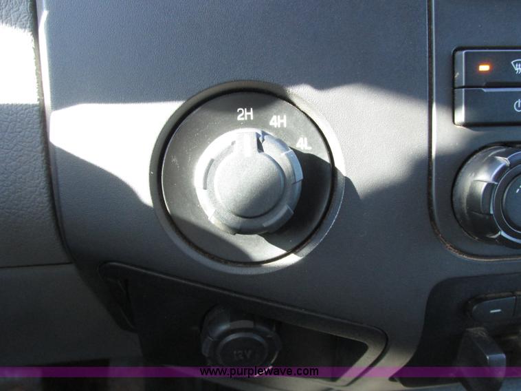 image for item J7688 2011 Ford F350 Super Duty SuperCab flatbed pickup truck