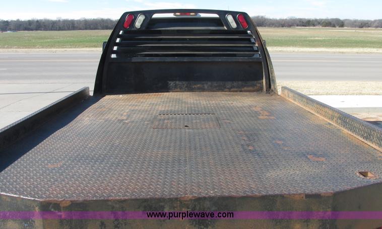 image for item J7688 2011 Ford F350 Super Duty SuperCab flatbed pickup truck