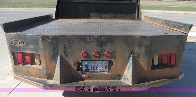 image for item J7688 2011 Ford F350 Super Duty SuperCab flatbed pickup truck