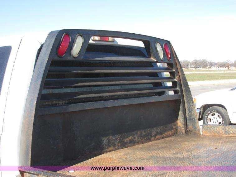 image for item J7688 2011 Ford F350 Super Duty SuperCab flatbed pickup truck