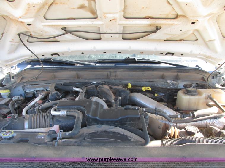 image for item J7688 2011 Ford F350 Super Duty SuperCab flatbed pickup truck